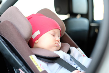 Baby sleeping in car seat