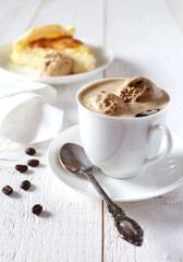 Black coffee with ice cream and cheesecake