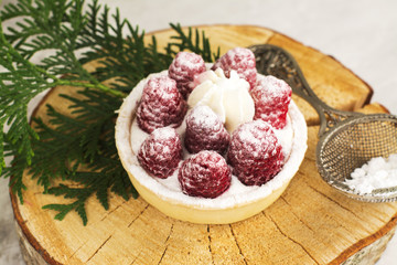 Sweet small tarts with fresh raspberry