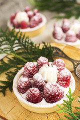 Sweet small tarts with fresh raspberry