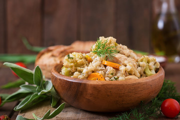 Tasty pearl barley porridge with vegetables and chicken