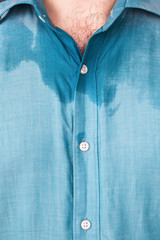 Sweaty spot on the shirt because of the heat, worries and diffid