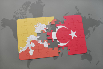 puzzle with the national flag of bhutan and turkey on a world map background.