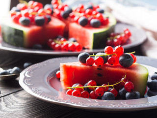 Slice of watermelon with berries