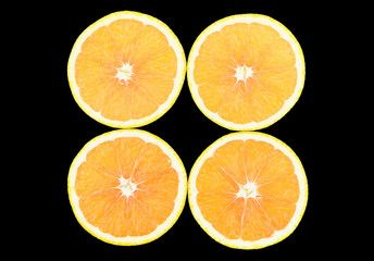 Four of cross section orange on black background