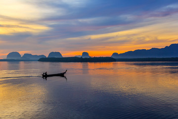 fisherman on local fishing boat at Samchong fishing village on sunrise in Phang-Nga,Thailand