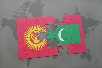 puzzle with the national flag of kyrgyzstan and maldives on a world map background.