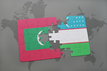 puzzle with the national flag of maldives and uzbekistan on a world map background.