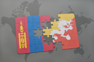 puzzle with the national flag of mongolia and bhutan on a world map background.