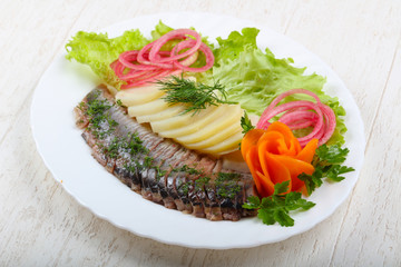 Herring with potato and onion