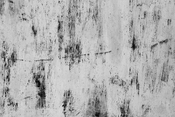 Wall fragment with scratches and cracks