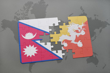 puzzle with the national flag of nepal and bhutan on a world map background.