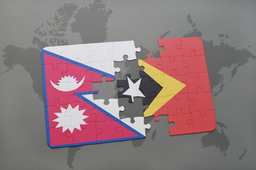 puzzle with the national flag of nepal and east timor on a world map background.