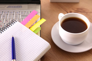 Designer working desk with a computer and paperwork
