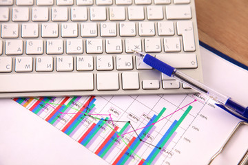 Obraz premium Designer working desk with a computer and paperwork