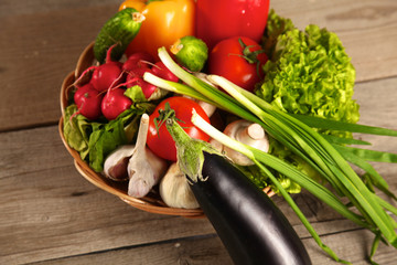 Fresh vegetables on a clean wooden table