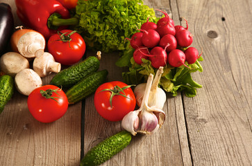 Fresh vegetables on a clean wooden table