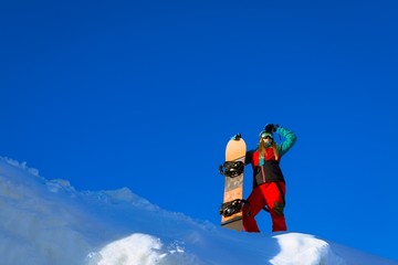 Fototapeta na wymiar Woman with snowboard