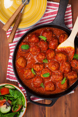 Meatballs in tomato sauce. Selective focus.