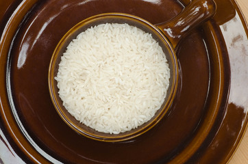 white raw rice in bowl