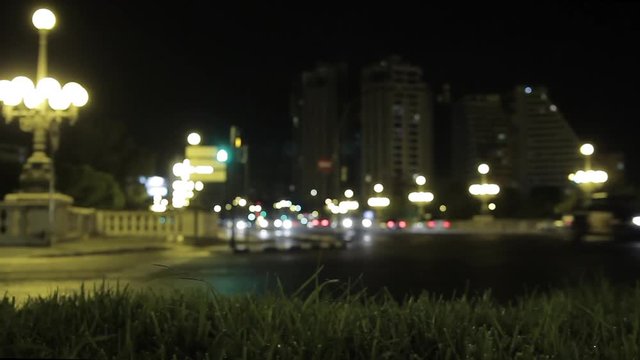 Traffic at night over bridge and crossing with beautiful lamppost in the background, RL Pan