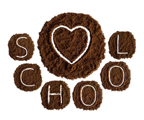 School and love, decorated with ground coffee on white background