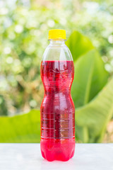 bottles with tasty drinks white nature background