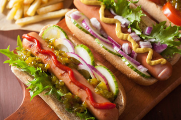 grilled hot dogs with vegetables ketchup mustard