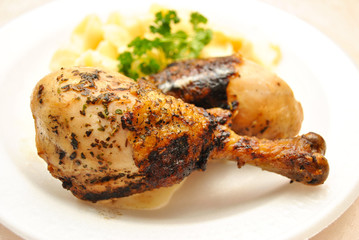 Close Up of Baked Chicken Legs Part of a Healthy Meal 