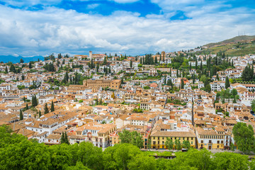 Fototapeta na wymiar Beautiful city panorama of Granada from the air, taken with a wide lens in a daytime. Granada, Andalusia, Spain