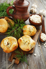 Baked buns stuffed with curd cheese