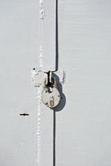 Rusty lock on garage gate