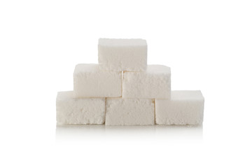 Sugar cubes on white background