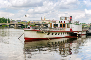 Fototapeta na wymiar boat on the Vltava River in Prague