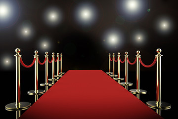 red carpet and rope barrier with shining spotlights
