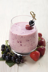 Smoothies of black currant  and strawberries    .