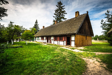 Fototapeta na wymiar Old fisherman's houses in Kluki village, Poland.