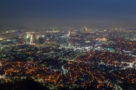 View of skyline in Seoul, South Korea, from above at night.