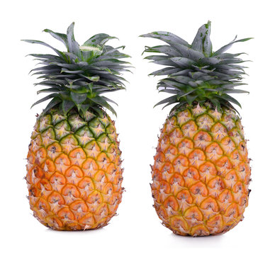 two ripe pineapple isolated on white background