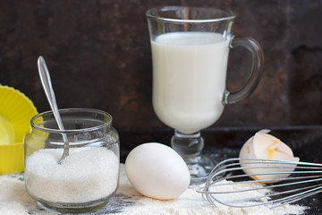 Ingredients for a cake on black stone