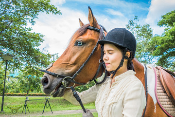 Fototapeta premium Take a horse out for a walk in the park.
