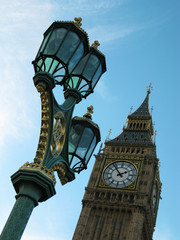 Fototapeta na wymiar Street lighting at Westminster Bridge and the tower Big Ben, London