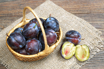 Plums in basket