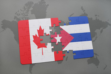 puzzle with the national flag of canada and cuba on a world map background.