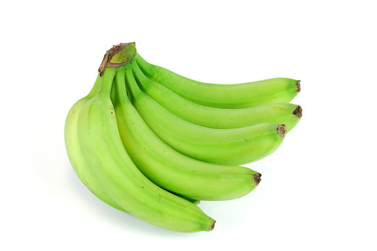 green bananas on white background