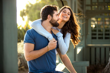 Elated couple lovers joyful bliss joy fun laughing playing youthful