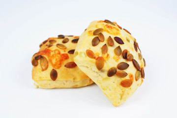 Wholegrain pumpkin seed bread on a white background.