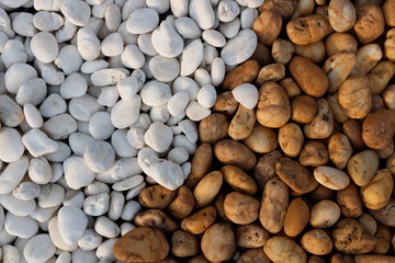 Two tone white and brown pebble stone background