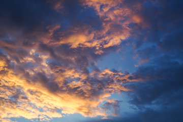 Fototapeta na wymiar golden light with cloudy on evening sky.
