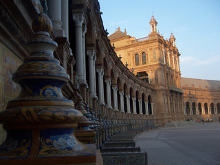 The Spain square in Seville, Spain at sunset. Detail of columns in the shadow.